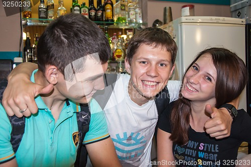 Image of The young man behind the bar