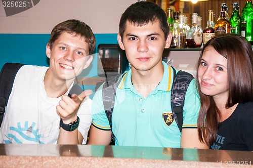 Image of The young man behind the bar