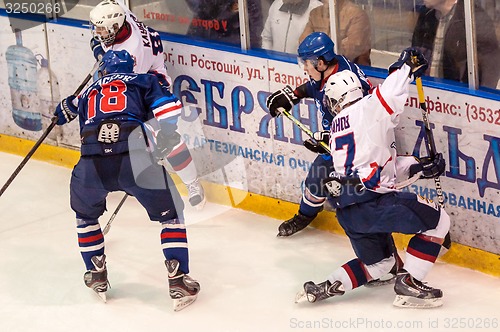 Image of Hockey with the puck, 