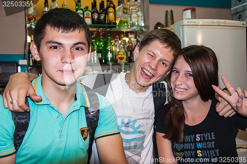 Image of The young man behind the bar