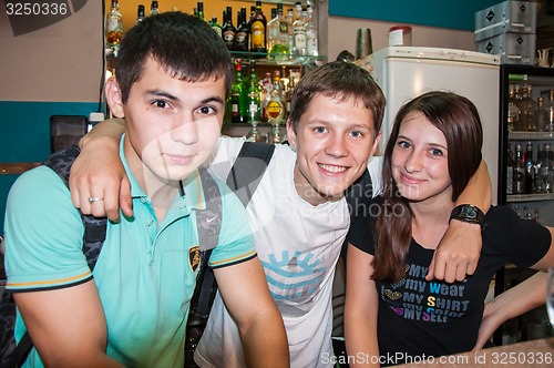 Image of The young man behind the bar