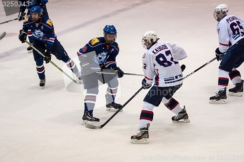 Image of Hockey with the puck, 