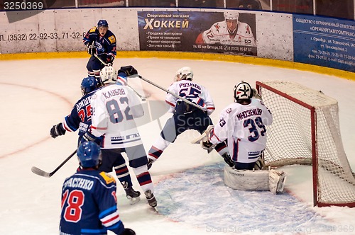 Image of Hockey with the puck, 