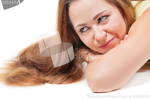 Image of Woman with long hair lying