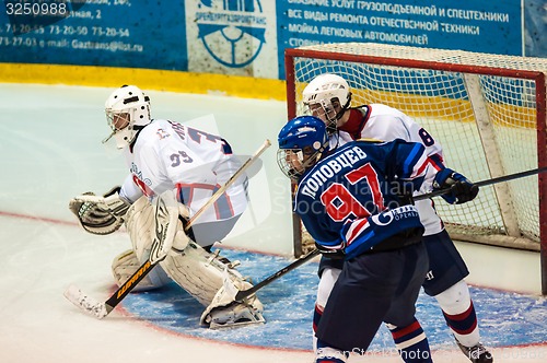 Image of Hockey with the puck, 
