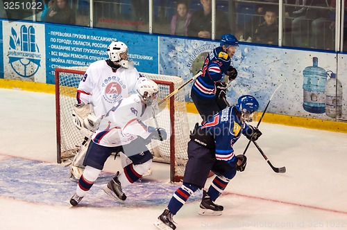 Image of Hockey with the puck, 