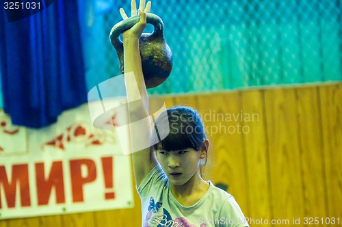 Image of The girl in the kettlebell sport