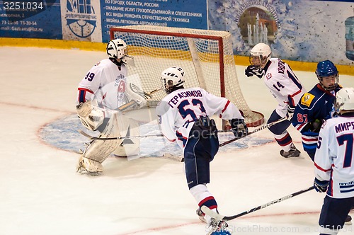 Image of Hockey with the puck, 