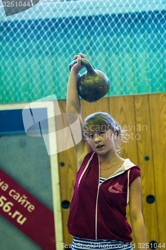 Image of The girl in the kettlebell sport