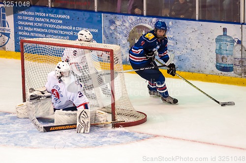 Image of Hockey with the puck, 