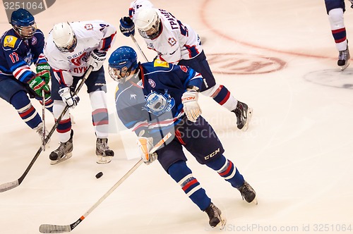 Image of Hockey with the puck, 