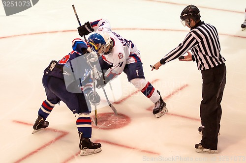 Image of Hockey with the puck, 