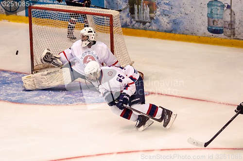 Image of Hockey with the puck, 