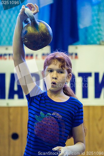 Image of The girl in the kettlebell sport