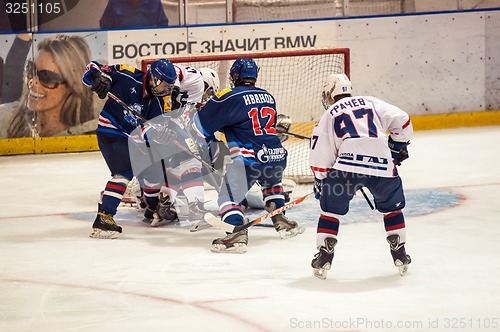 Image of Hockey with the puck, 