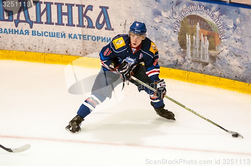 Image of Hockey with the puck, 