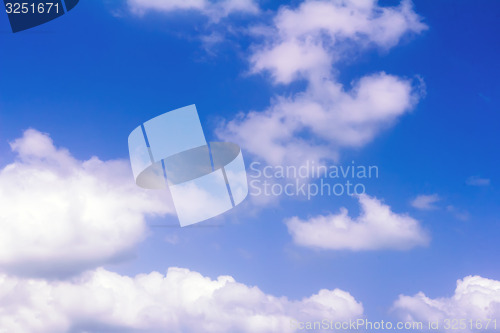 Image of Blue sky and white fluffy clouds.