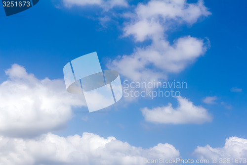 Image of Blue sky and white fluffy clouds.