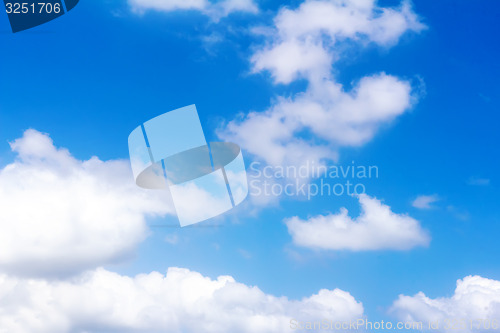 Image of Blue sky and white fluffy clouds.