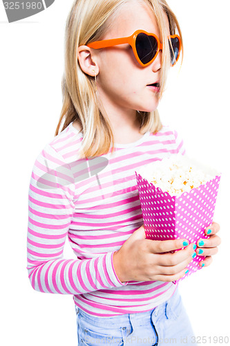 Image of Girl eating pop corn