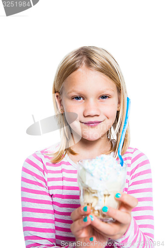 Image of Girl holding ice cream dessert