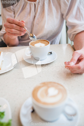 Image of Cups of delicious coffee