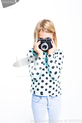 Image of Girl with an old camera