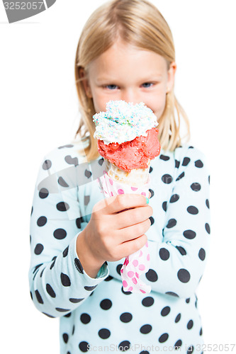 Image of Girl holding a delicious ice cream cone