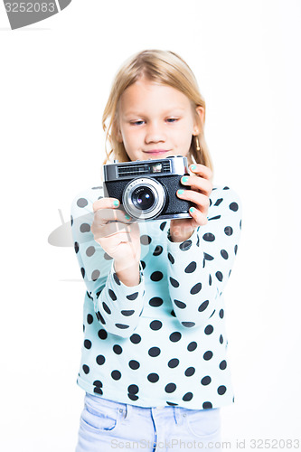 Image of Girl with an old camera