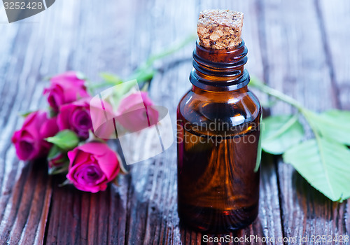 Image of rose oil in bottle 