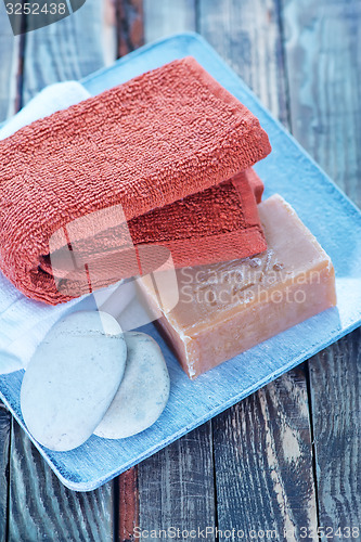 Image of soap, stones and towels 