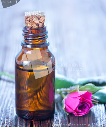 Image of rose oil in bottle 