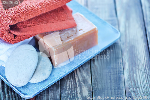 Image of soap, stones and towels 