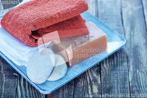 Image of soap, stones and towels 