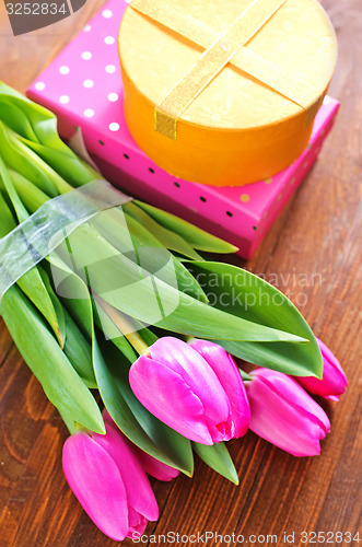 Image of present and tulips