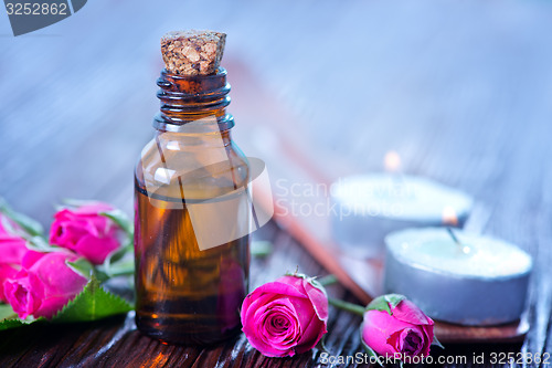 Image of rose oil in bottle 