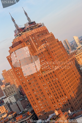 Image of USA, NEW YORK CITY - April 27, 2012  Bottom up amazing view of Manhattan skyscraper. Midtown Manhattan, or simply Midtown, represents the middle portion of the borough and island of Manhattan in New Y