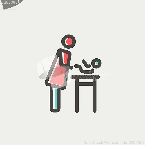 Image of Woman changing the baby diaper thin line icon