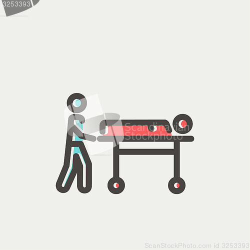 Image of Man pushing the stretcher with sick person thin line icon