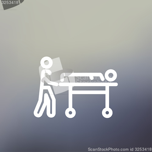 Image of Man pushing the stretcher with sick person thin line icon