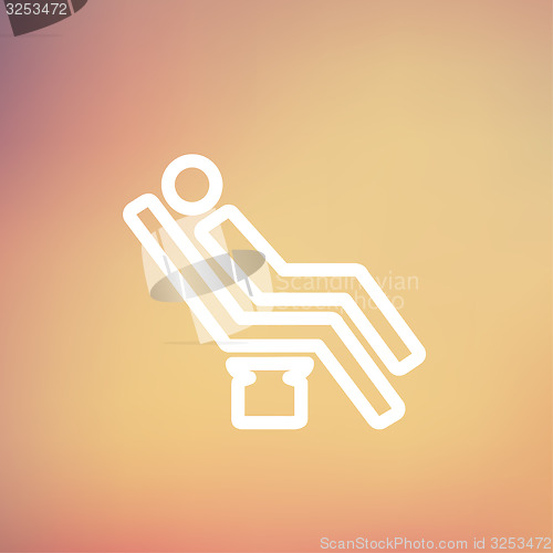 Image of Man sitting on the dental chair thin line icon