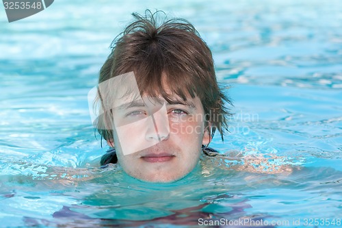 Image of man  in a swimming pool 