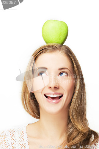 Image of apple on her head