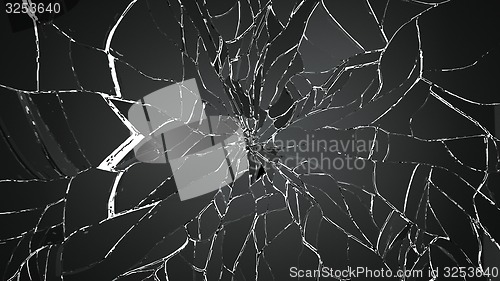 Image of Pieces of shattered or cracked glass on white