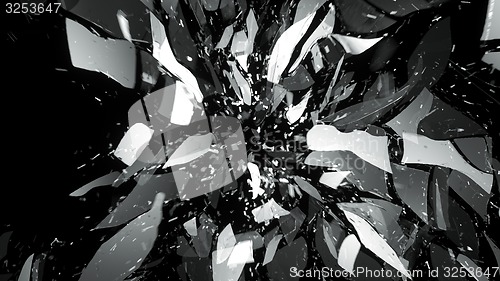Image of Broken pieces of glass on black with motion blur