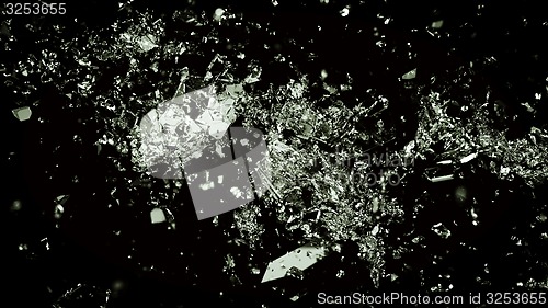 Image of Pieces of shattered or cracked glass on black