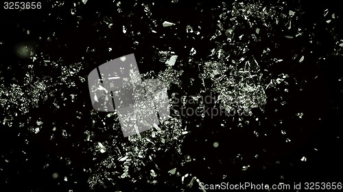 Image of Many Pieces of splitted or cracked glass on black