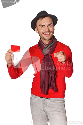 Image of Smiling casual man showing blank credit card