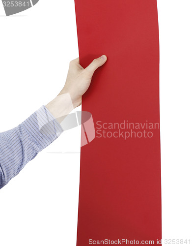Image of Hand holdong a paper.