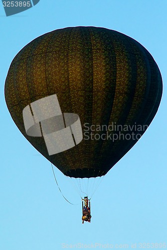 Image of unique hot air balloon flying